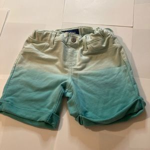Green and teal jean shorts